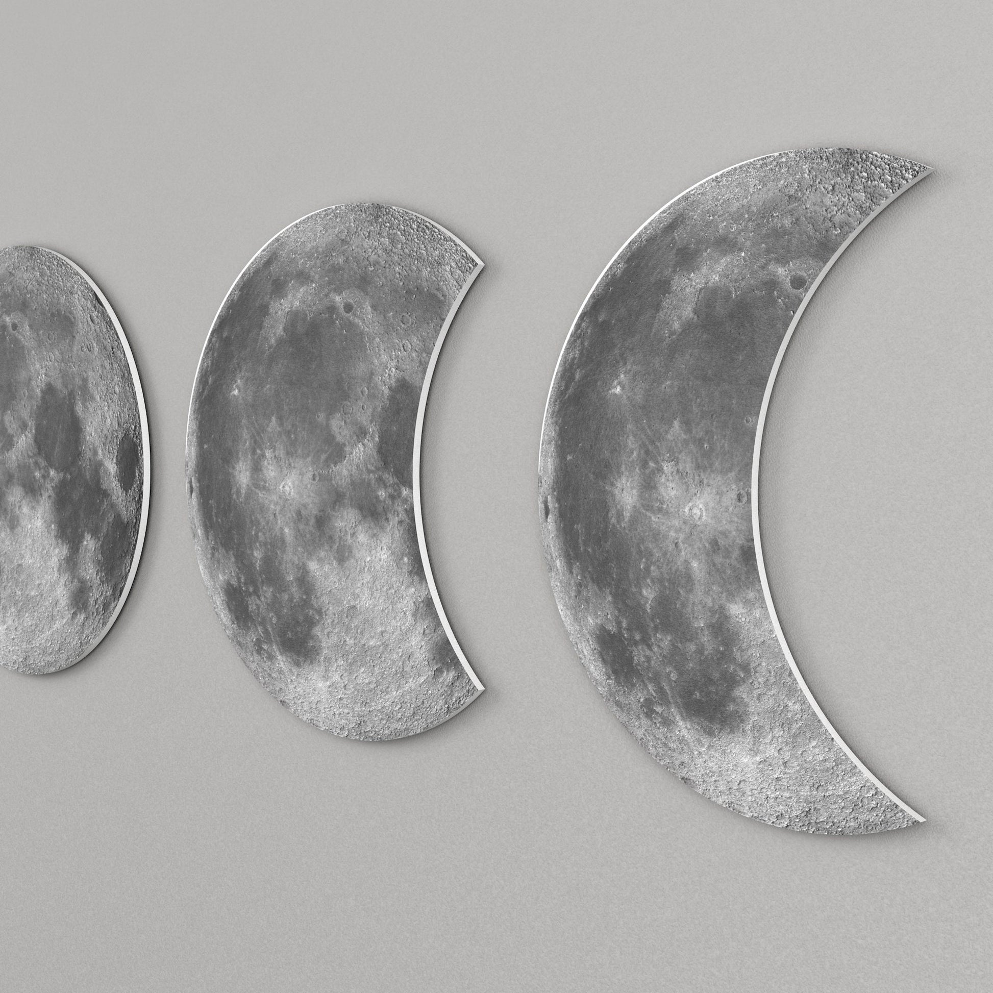 Close-up of moon phase wall decor showing detailed lunar surface and layered 3D design